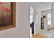 Hallway with light-colored walls, an adjacent room visible, and an art piece to the left at 15248 Pangborn Pl, Charlotte, NC 28278