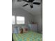 Bedroom featuring ceiling fan, pillows, and two windows at 166 Eagle Dr, New London, NC 28127