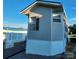 Exterior view showing a side of a manufactured home and blue sky backdrop at 166 Eagle Dr, New London, NC 28127