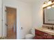 Bathroom features granite counters and wooden vanity at 1928 Providence Rd, Charlotte, NC 28211