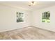 Bedroom with plenty of natural light from two large windows at 1928 Providence Rd, Charlotte, NC 28211