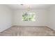 Bright bedroom with large window and ample natural light at 1928 Providence Rd, Charlotte, NC 28211