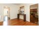 Entryway with hardwood floors, a console table, and white paneled walls at 1928 Providence Rd, Charlotte, NC 28211