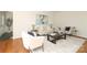 Bright and airy living room with plush seating and hardwood floors at 1928 Providence Rd, Charlotte, NC 28211