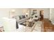 Bright living room features hardwood floors, a neutral color palette, and natural light at 1928 Providence Rd, Charlotte, NC 28211