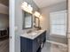 Elegant bathroom boasts double sinks, sleek fixtures, and ample counter space at 2003 Trigger Dr, Indian Trail, NC 28079