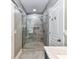 Modern bathroom features a glass-enclosed shower and stylish tile work at 2003 Trigger Dr, Indian Trail, NC 28079