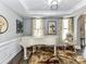 Elegant living room with a baby grand piano, wainscotting, and stylish decor at 2003 Trigger Dr, Indian Trail, NC 28079