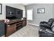A cozy entertainment space with an entertainment center and comfortable seating at 2003 Trigger Dr, Indian Trail, NC 28079