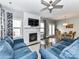 Spacious living room featuring a fireplace, hardwood floors, and ample seating at 2003 Trigger Dr, Indian Trail, NC 28079