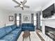 Bright living room with fireplace, hardwood floors, and comfortable seating at 2003 Trigger Dr, Indian Trail, NC 28079