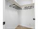 Walk-in closet features ample storage space with white shelving and hanging rods at 207 Knot St, Shelby, NC 28150