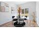Cozy dining area with modern decor, stylish chairs, and natural light from sliding glass door at 213 Knot St, Shelby, NC 28150