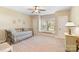 Comfortable bedroom featuring carpeted floors, ample natural light, and modern trim at 230 Washam Rd, Mooresville, NC 28117