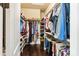 Spacious walk-in closet with custom shelving and ample storage space for clothes and accessories at 230 Washam Rd, Mooresville, NC 28117