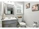 Charming bathroom with painted vanity, ample counter space and decorative wall art at 2367 24Th Street Ne Ln, Hickory, NC 28601