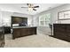 Spacious bedroom featuring a large window, ceiling fan and carpet at 2367 24Th Street Ne Ln, Hickory, NC 28601