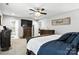 Large primary bedroom with carpet, a ceiling fan and a tv at 2367 24Th Street Ne Ln, Hickory, NC 28601
