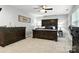 Relaxing bedroom with carpet, featuring a decorative sign and plenty of drawer storage at 2367 24Th Street Ne Ln, Hickory, NC 28601