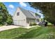 Exterior of home features an attached 2 car garage, deck, hot tub, and large backyard at 2367 24Th Street Ne Ln, Hickory, NC 28601