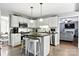 Bright kitchen with a functional island, stainless steel appliances, and convenient bar stool seating at 2367 24Th Street Ne Ln, Hickory, NC 28601