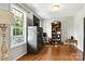 Cozy living room featuring beautiful wood floors and natural light from a large window at 2367 24Th Street Ne Ln, Hickory, NC 28601