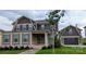 Charming two-story home featuring a covered front porch and attached two-car garage, all beautifully landscaped at 259 Luray Way # 443, Rock Hill, SC 29730