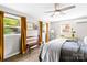 Bright bedroom with a ceiling fan, natural light and light grey walls at 2919 Dunaire Dr, Charlotte, NC 28205