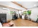 Spacious home gym with hardwood floors, natural light, and modern exercise equipment at 2919 Dunaire Dr, Charlotte, NC 28205