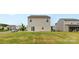 A view of the backyard showing the lawn and siding at 331 Gaines Rd, Clover, SC 29710