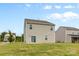 A view of the backyard with a healthy lawn at 331 Gaines Rd, Clover, SC 29710