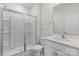 Modern bathroom with glass enclosed shower, white fixtures and clean finishes at 331 Gaines Rd, Clover, SC 29710