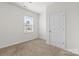 Bright bedroom features neutral walls, carpet, and a window offering natural light at 331 Gaines Rd, Clover, SC 29710