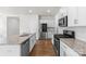 Well-equipped kitchen featuring granite countertops, stainless steel appliances, and white cabinetry at 331 Gaines Rd, Clover, SC 29710