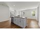Open kitchen with granite counters, stainless appliances, and hardwood floors at 331 Gaines Rd, Clover, SC 29710