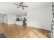 This open-concept living area showcases hardwood flooring and a nearby kitchen at 331 Gaines Rd, Clover, SC 29710
