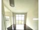 Bright living room featuring hardwood flooring and large windows at 333 W Trade St # 505, Charlotte, NC 28202