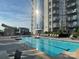 Stunning pool area with lounge chairs and city views, perfect for relaxing and enjoying the urban scenery at 333 W Trade St # 505, Charlotte, NC 28202