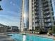 Stunning pool area with lounge chairs and city views, perfect for relaxing and enjoying the urban scenery at 333 W Trade St # 505, Charlotte, NC 28202