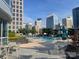 Rooftop pool surrounded by city buildings and seating, offering a perfect blend of relaxation and urban views at 333 W Trade St # 505, Charlotte, NC 28202