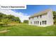 The home has a large backyard with a beautiful lawn and lots of trees at 4266 Sylvan Pond Ct, Denver, NC 28037
