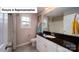 Bathroom featuring a single sink vanity with granite countertop and tile flooring at 4266 Sylvan Pond Ct, Denver, NC 28037