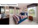 Bedroom with many windows and natural light, unique decor, and comfortable bed at 4266 Sylvan Pond Ct, Denver, NC 28037