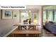 Dining area with modern light fixture and natural light coming in from two windows at 4266 Sylvan Pond Ct, Denver, NC 28037