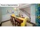 Elegant dining room with stylish chandelier, wainscoting, hardwood floors, and large windows with custom curtains at 4266 Sylvan Pond Ct, Denver, NC 28037