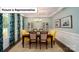 Beautiful dining room with a decorative chandelier, wainscoting, hardwood floors, and large windows with curtains at 4266 Sylvan Pond Ct, Denver, NC 28037
