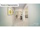 Bright hallway with neutral paint, carpet, and views to bedroom at 4266 Sylvan Pond Ct, Denver, NC 28037