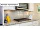 Modern kitchen featuring stainless steel appliances, granite countertops, white cabinets, and subway tile backsplash at 4266 Sylvan Pond Ct, Denver, NC 28037