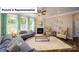 Bright living room with natural light, fireplace, and ceiling fan at 4266 Sylvan Pond Ct, Denver, NC 28037