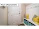 Convenient mudroom entry with a storage bench and coat hooks at 4266 Sylvan Pond Ct, Denver, NC 28037